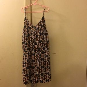 pink and blue and white button up romper